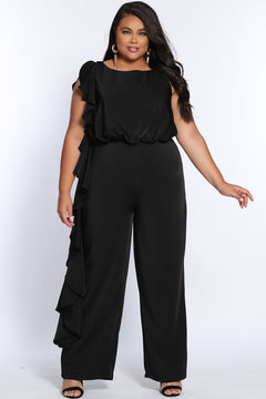 CE2014 by Sydney's Closet french crepe fabric jumpsuit with flounce on side of bodice and pant with center back zipper and scoop neckline, bra friendly straps and sleeveless available in red, black and ivory.