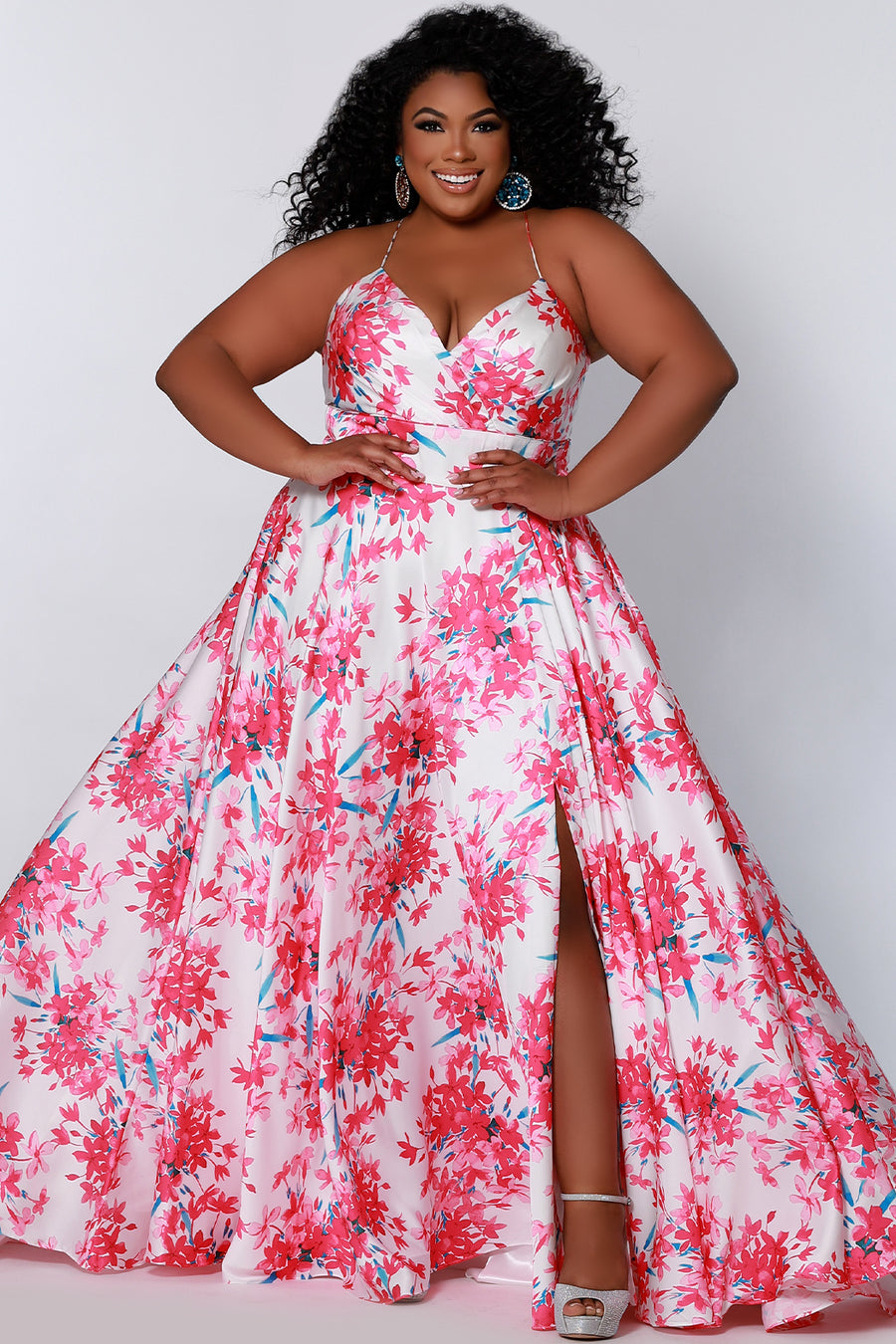 CE2206 Celebrations by Sydney's Closet aline silhouette with sweetheart neckline and spaghetti straps dress features zipper back with leg slit and pockets available in pink blossom and yellow blossom