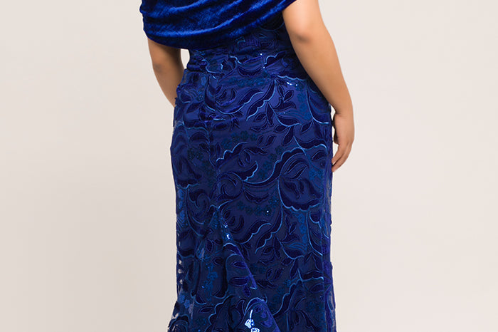 JK2005 royal blue velvet and embellished tulle mermaid plus size evening gown. Semi-sweetheart neckline, detachable velvet wrap, floor length fit and flare skirt with sweep train.