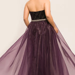 JK2017 deep purple plus size evening gown with strapless sweetheart bodice, beaded waistline, velvet sheath silhouette with embellished silver design. Attached organza fly-away skirt overlay with sweep train.
