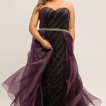 JK2017 deep purple plus size evening gown with strapless sweetheart bodice, beaded waistline, velvet sheath silhouette with embellished silver design. Attached organza fly-away skirt overlay with sweep train.