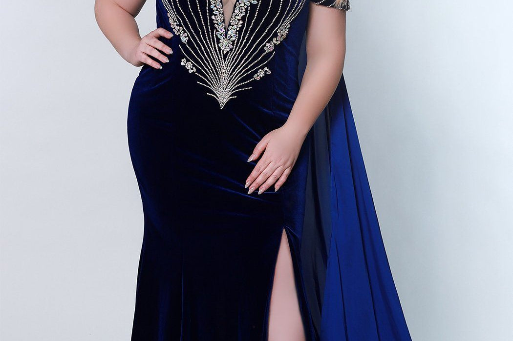 Johnathan Kayne for Sydney's Closet fitted silhouette sweetheart neckline with cape and skirt slit made with stretch velvet available in royal and onyx Jaguar Pageant Gown JK2202