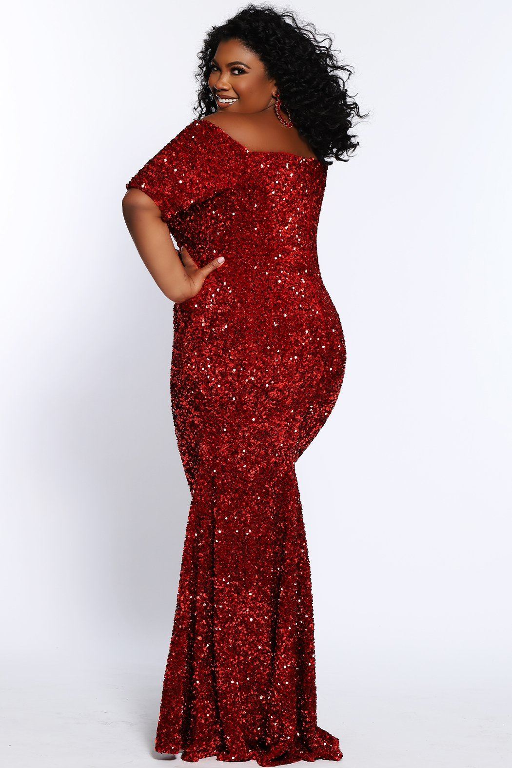 Best seller! Johnathan Kayne for Sydney's Closet plus size pageant, prom, evening, mother of the bride or groom formal gown.  Off-the-shoulder sleeves and fitted silhouette made in vibrant stretch sequins. Style JK2208