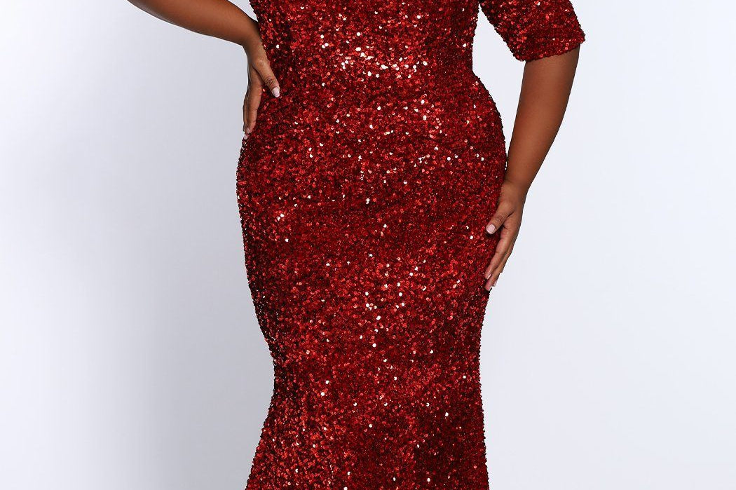 Johnathan Kayne for Sydney's Closet slim fitted silhouette with half sleeves and made with velvet sequin fabric available in cherry and indigo Spark Evening Gown JK2208