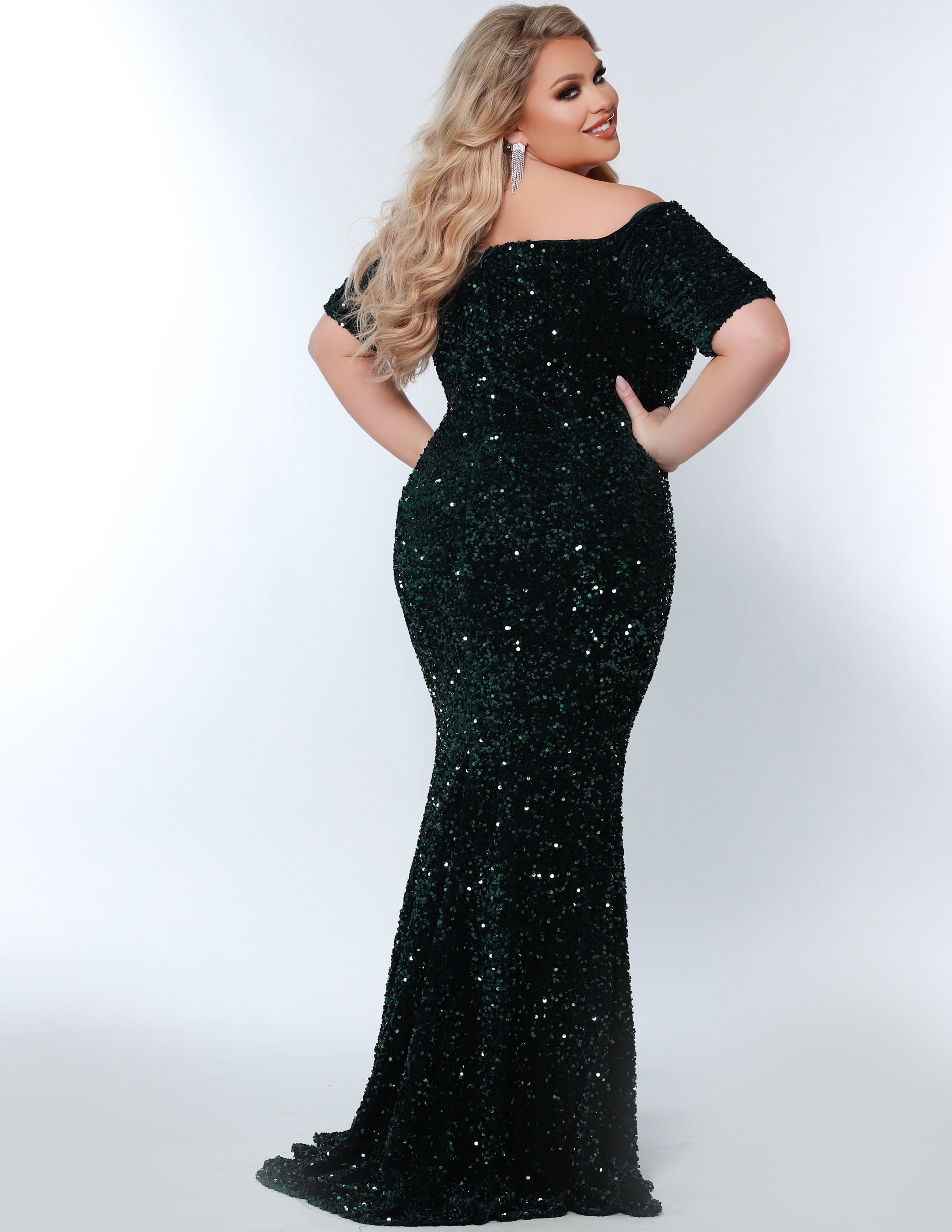 Best seller! Johnathan Kayne for Sydney's Closet plus size pageant, prom, evening, mother of the bride or groom formal gown.  Off-the-shoulder sleeves and fitted silhouette made in vibrant stretch sequins. Style JK2208