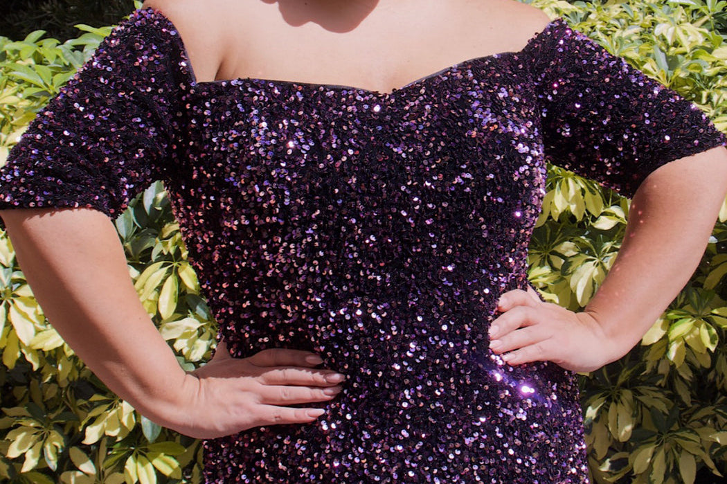 Best seller! Johnathan Kayne for Sydney's Closet plus size pageant, prom, evening, mother of the bride or groom formal gown.  Off-the-shoulder sleeves and fitted silhouette made in vibrant stretch sequins. Style JK2208