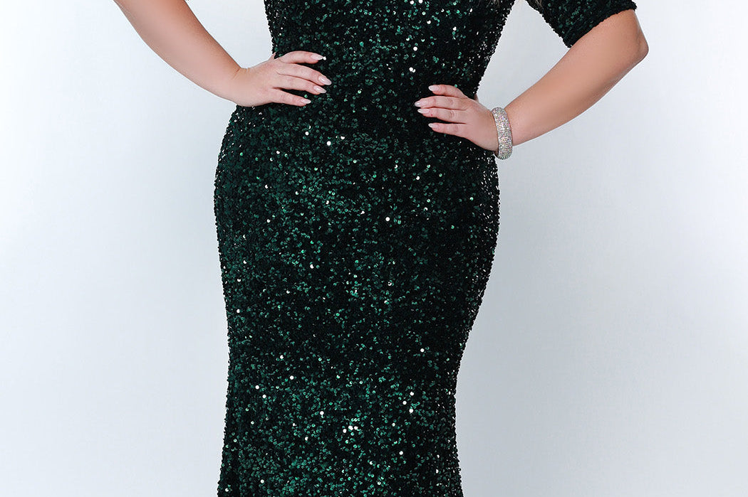 Best seller! Johnathan Kayne for Sydney's Closet plus size pageant, prom, evening, mother of the bride or groom formal gown.  Off-the-shoulder sleeves and fitted silhouette made in vibrant stretch sequins. Style JK2208