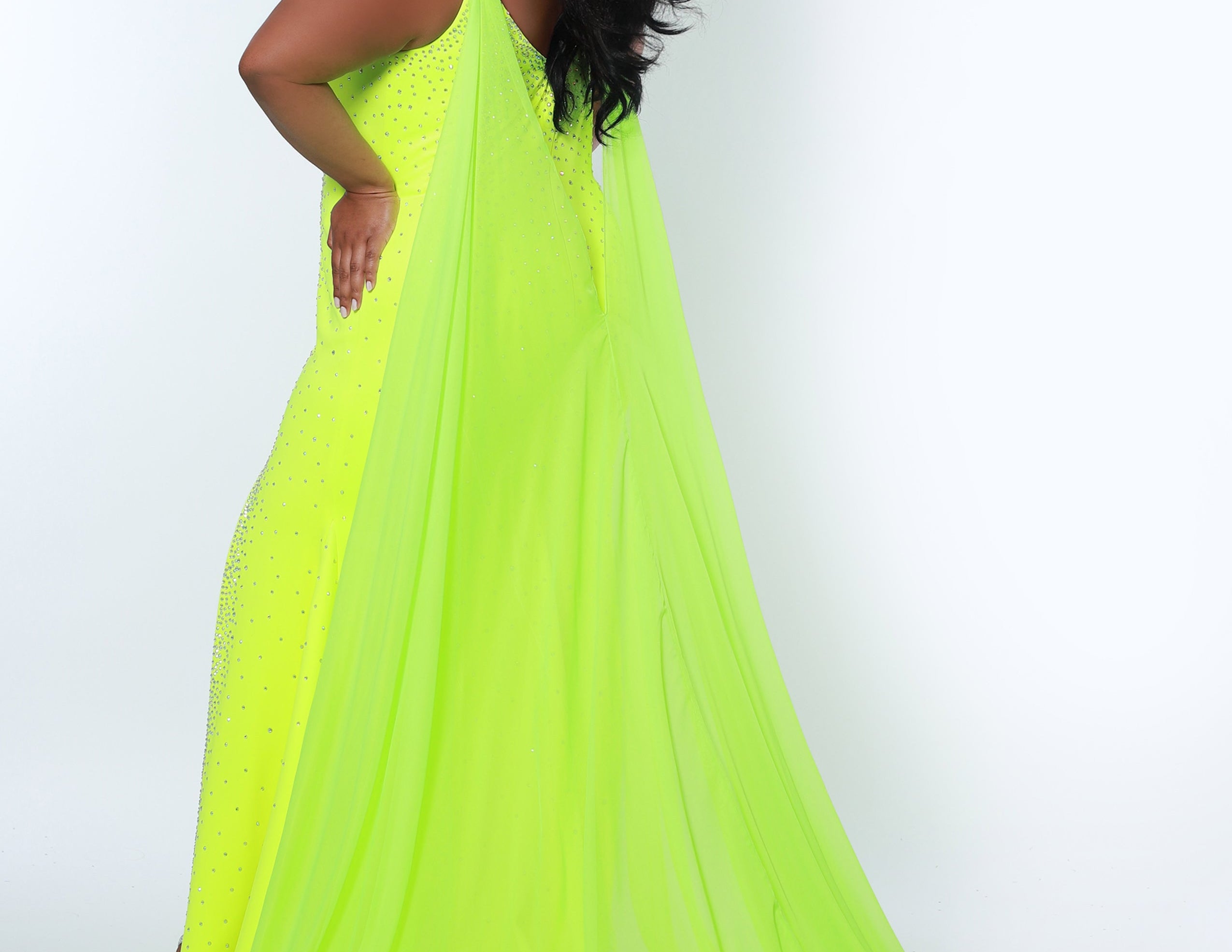 Johnathan Kayne for Sydney's Closet princess line slim silhouette with deep v neckline all over ab hotfix stones and center back zipper available in deep red, hot coral and white ice Maverick Pageant Gown JK2218 - Now also avialable in neon Lemon Lime, deep purple and aquamarine.