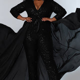 Johnathan Kayne for Sydney's Closet jumpsuit with v neckline and detatchable charmeuse overskirt and long sleeves made of stretch sequin fabric available in firecracker and jet Matador Pageant Jumpsuit JK2220