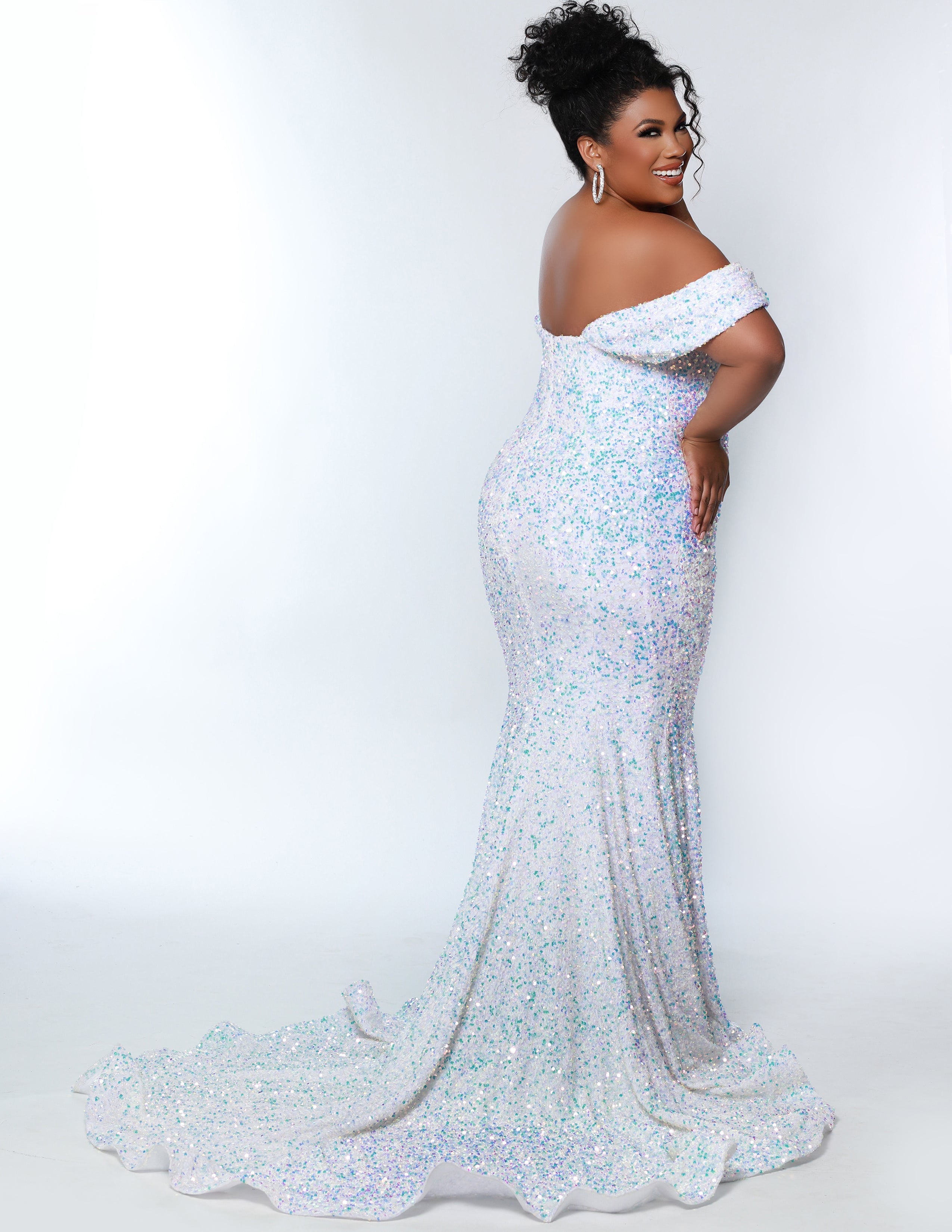 Johnathan Kayne for Sydney's Closet JK2313 Unicorn. Sequin paillette on stretch velvet, Mermaid/Fitted silhouette, Sweetheart neckline, Detachable drape sleeve, Natural waistline, Long invisible center back zipper, Slim/fitted skirt, Train with center back godet, Horsehair hem