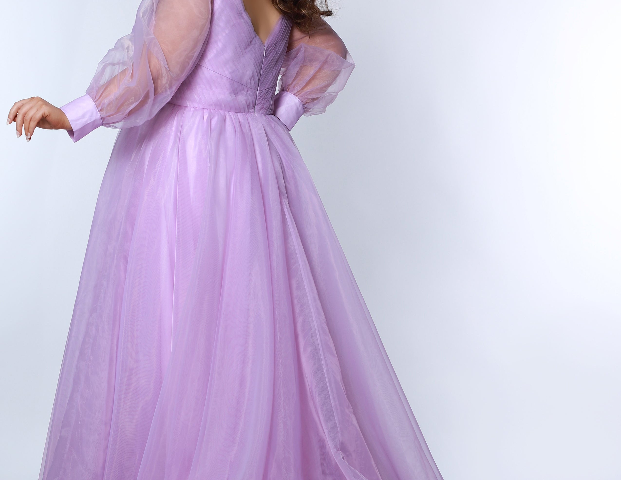 JK2317 plus size organza evening gown.  V-neckline, puff sleeves with cuff, pleated organza bodice and sweep train. Available in lilac purple, sky blue and diamond white. Johnathan Kayne for Sydney's Closet.