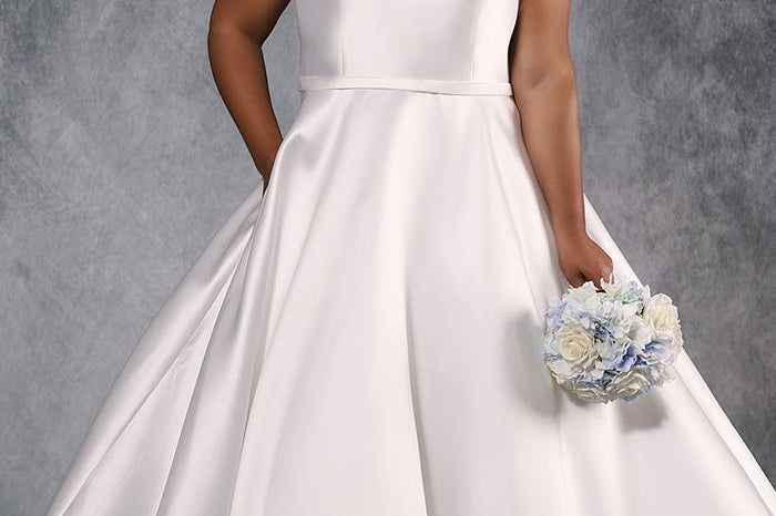 MB2022 Mikado satin plus size wedding dress with V-neckline, bra-friendly straps, full A-line satin skirt with pockets, center-back zipper and chapel train.