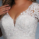 Cydni Bridal Gown MB2110 by Sydney's Closet A-line ballgown with illusion mesh sleeves and appliques with zipper back available in ivory/ivory, ivory/champagne, ivory/pink champagne