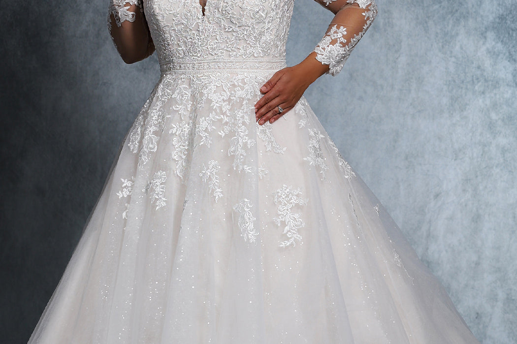 Cydni Bridal Gown MB2110 by Sydney's Closet A-line ballgown with illusion mesh sleeves and appliques with zipper back available in ivory/ivory, ivory/champagne, ivory/pink champagne