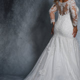 Jennifer Bridal Gown MB2114 by Sydney's Closet fitted mermaid with illusion mesh sleeves and appliques zipper back with clear buttons available in ivory
