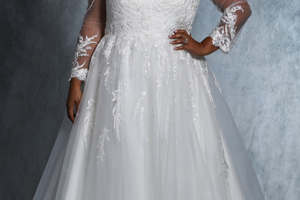 Madonna Bridal Gown MB2118 by Sydney's Closet A-line ballgown with illusion mesh sleeves with appliques and lace up back availavle in black/black, ivory/ivory, white/white, black/ivory, ivory/black