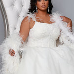 Michelle Bridal MB2201 plus size wedding gown with detachable feather straps, exposed boning, floral appliques and train - editorial on royal throne