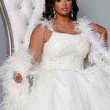 Michelle Bridal MB2201 plus size wedding gown with detachable feather straps, exposed boning, floral appliques and train - editorial on royal throne