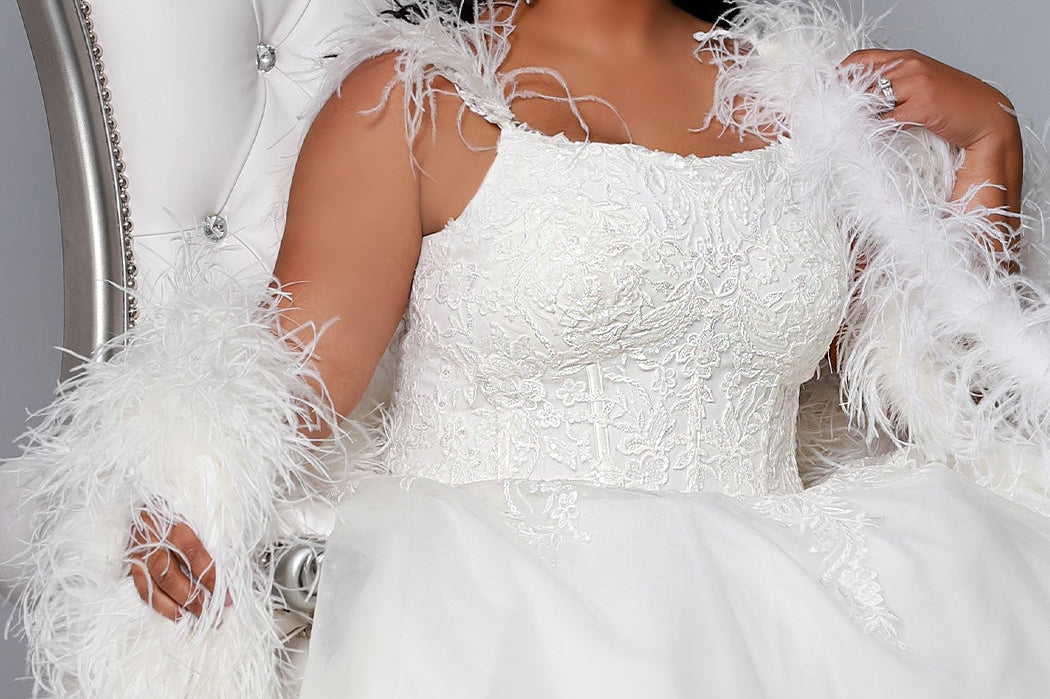 Michelle Bridal MB2201 plus size wedding gown with detachable feather straps, exposed boning, floral appliques and train - editorial on royal throne
