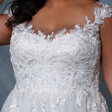 Michelle Bridal MB2204 Close up on front of dress of lace detailing.