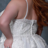 Michelle Bridal MB2205 Up close back view showing floral lace details on back of bodice and button details. 