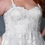 Michelle Bridal MB2205 Close Up shot of floral lace bodice, sweetheart neckline, and ivory straps. 