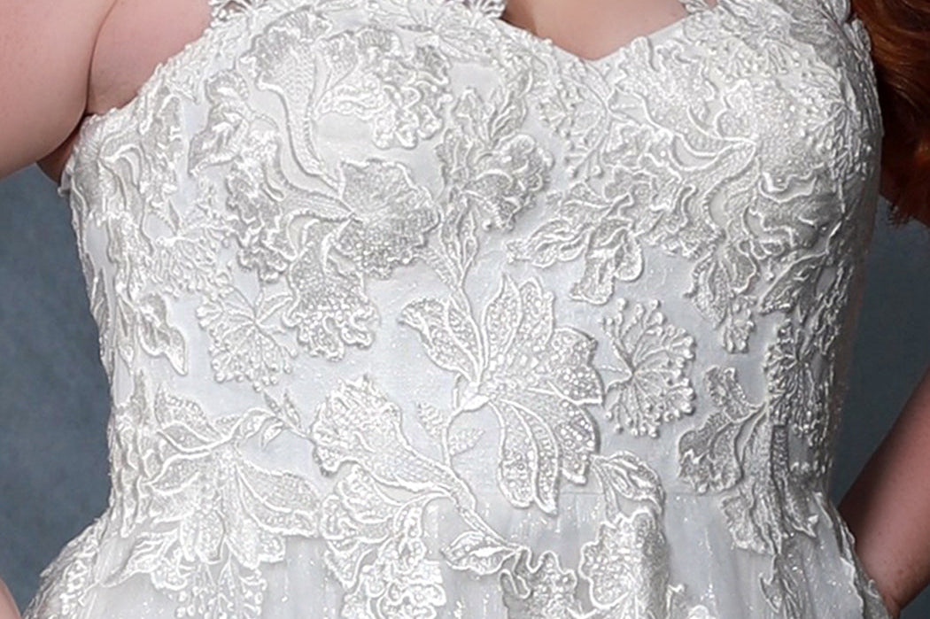 Michelle Bridal MB2205 Close Up shot of floral lace bodice, sweetheart neckline, and ivory straps. 