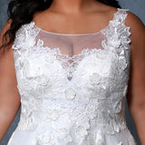 Michelle Bridal MB2206 Up Close Shot of Plus Size A-line wedding dress with lace bodice, and a sweetheart neckline under an ivory mesh scoop neckline.