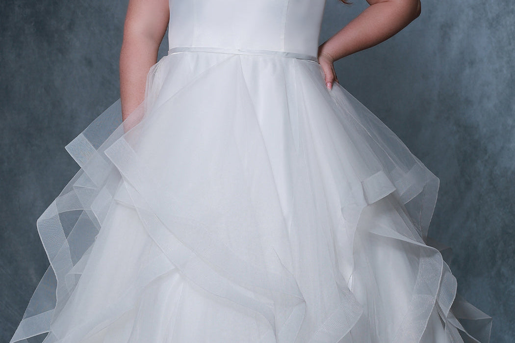 Michelle Bridal MB2207 plus size a-line wedding dress with satin sweetheart top, spaghetti straps, and a tulle layered skirt. 