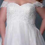 Michelle Bridal MB2211 close up on plus size ballgown in ivory champagne with sweetheart neckline, lace bodice, and lace detachable off the shoulder straps. 