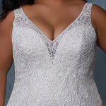 Michelle Bridal MB2212 Close up of lace detail and v-neckline. 