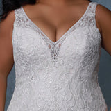 Michelle Bridal MB2212 Close up of lace detail and v-neckline. 