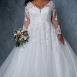 Michelle Bridal BB2213 Ivory/Ivory Plus size A-line wedding dress with mesh and lace long sleeves, v-neckline, lace bodice, and sparkly tulle skirt.