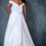 Michelle Bridal by Sydney's Closet MB2217 aline silhouette with off the shoulder straps and 13 bones in bodice this dress features 120 satin covered buttons on the back of train with a center back zipper and pockets available in black ivory and white