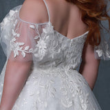 Michelle Bridal by Sydney's Closet MB2218 v neckline aline silhouette with 8 bones in bodice and spaghetti straps with beading and off the shoulder flutter sleeve with elastic band dress also features soft bridal tulle and sparkle tulle and invisible center back zipper available in ivory
