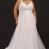 Michelle Bridal Style MB2301 available in sand or ivory. Plus size A-line wedding gown with modern leaf lace, decorative straps on the back bodice and long train. Only sold in stores. 