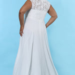 SC5235 plus size ivory bridal dress with empire waistline, lace V-bodice, small cap sleeve and floor length chiffon skirt.