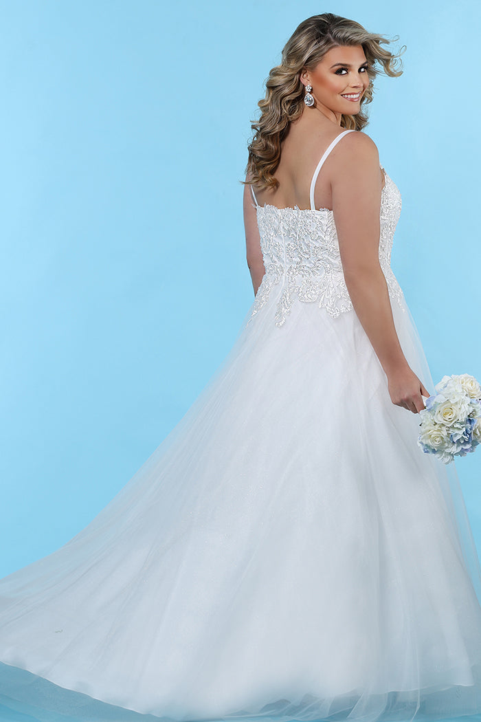 SC5239 plus size ivory bridal gown with an A-line silhouette, sweetheart bodice with lace appliques, spaghetti straps, center-back zipper and full tulle skirt.