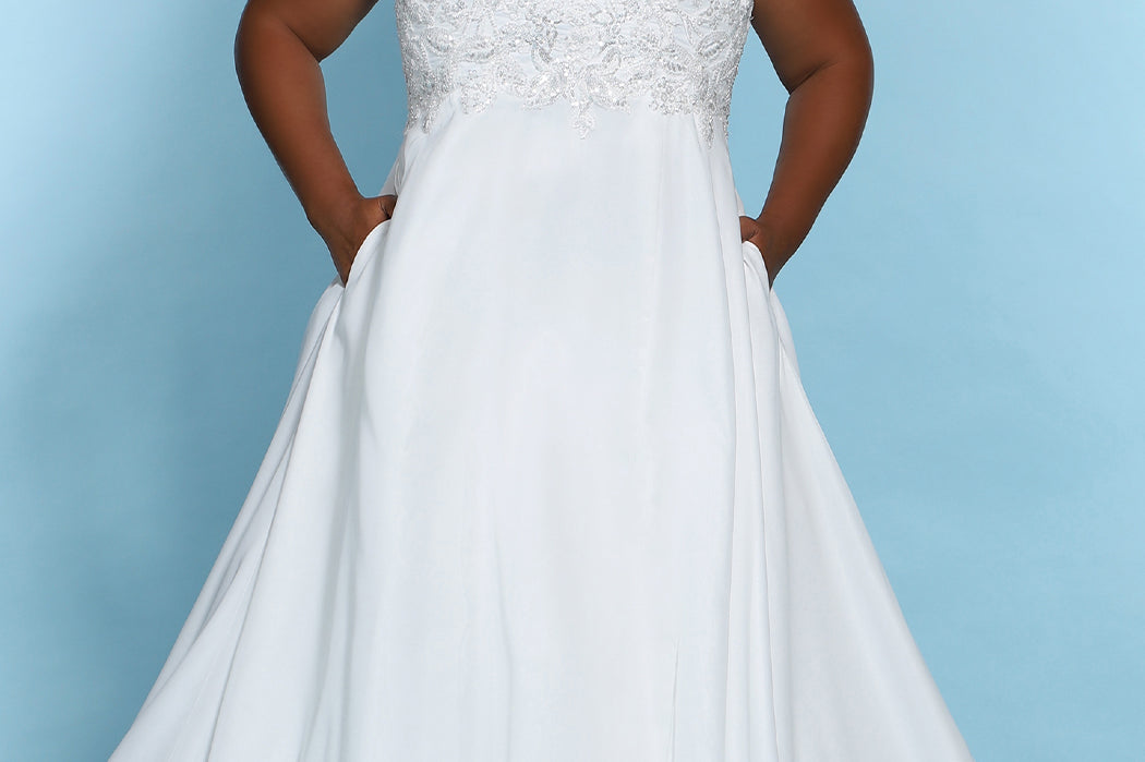 Katy Bridal Gown SC5246 by Sydney's Closet optional back lining included A-Line with chiffon skirt and heavily appliqued bodice with pockets and zipper back available in Ivory