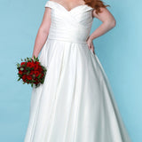 Stunning plus size ivory or black wedding gown SC5257 by Syudney's Closet. Pleated bodice, off-the-shoudler straps, pockets and full A-line skirt with covered buttons down the back. 