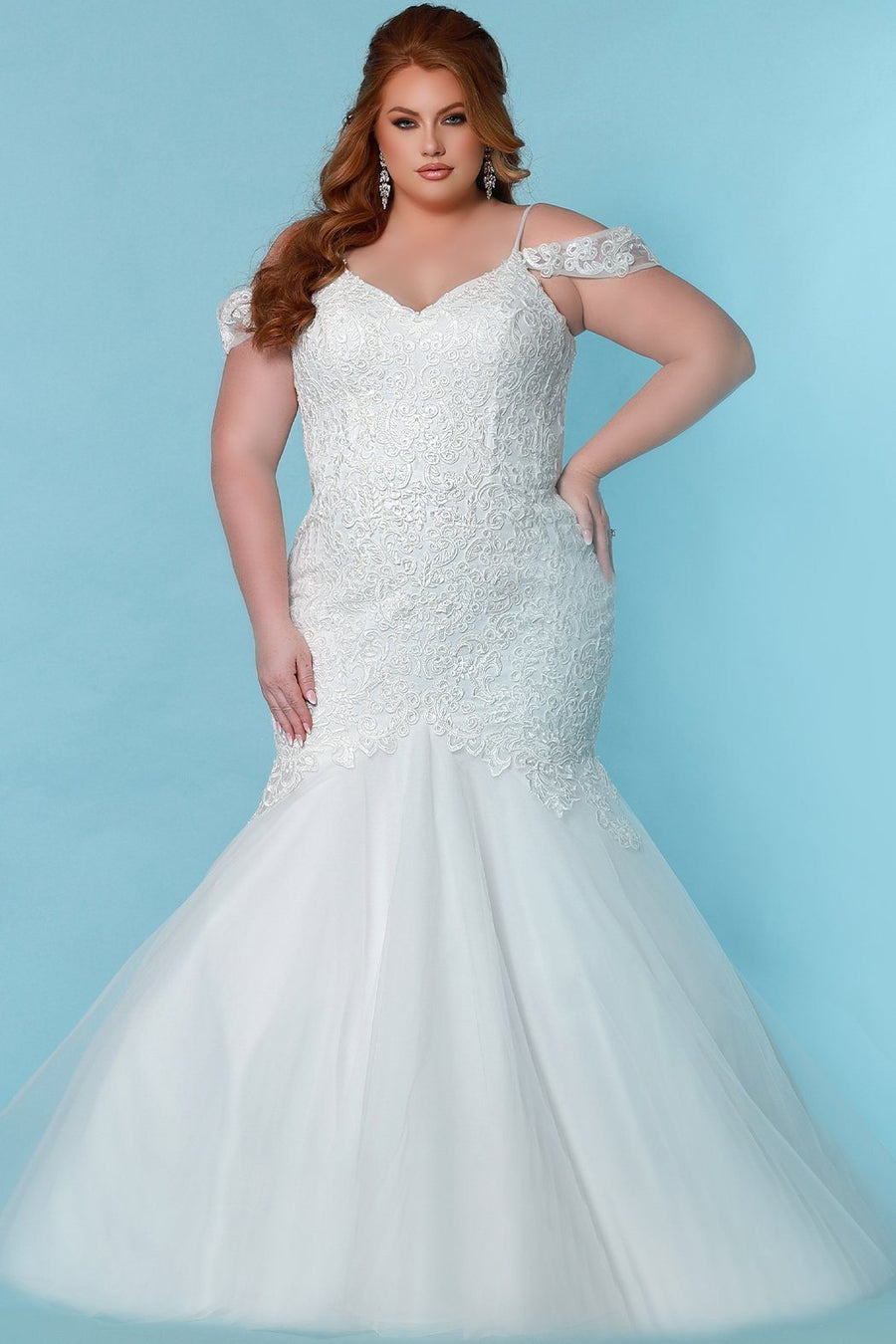 Sydney's Bridal by Sydney's Closet mermaid silhouette with off the shoulder straps and soft bridal tulle with center back zipper and corded lace appliques available in ivory SC5273