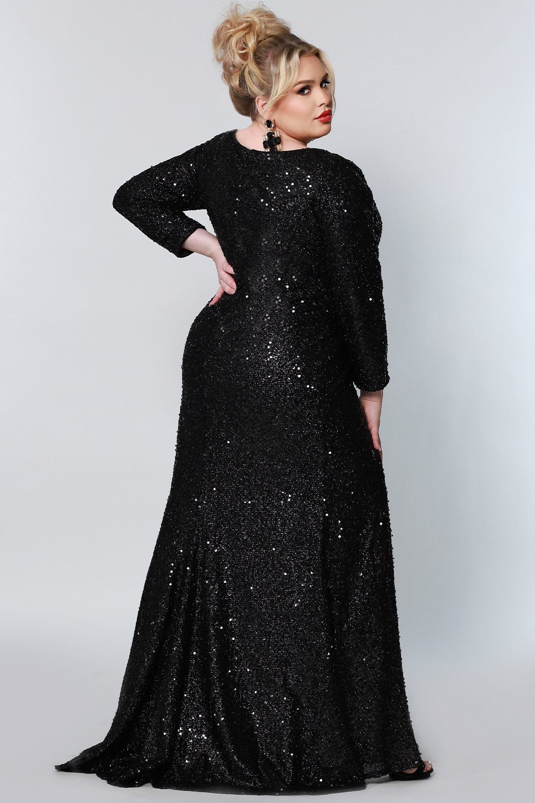  Sydney's Prom by Sydney's Closet fitted silhouette with scoop neckline long sleeves with zipper back and sequin fabric available in pearlescent, ruby, onyx and sapphire SC7320
