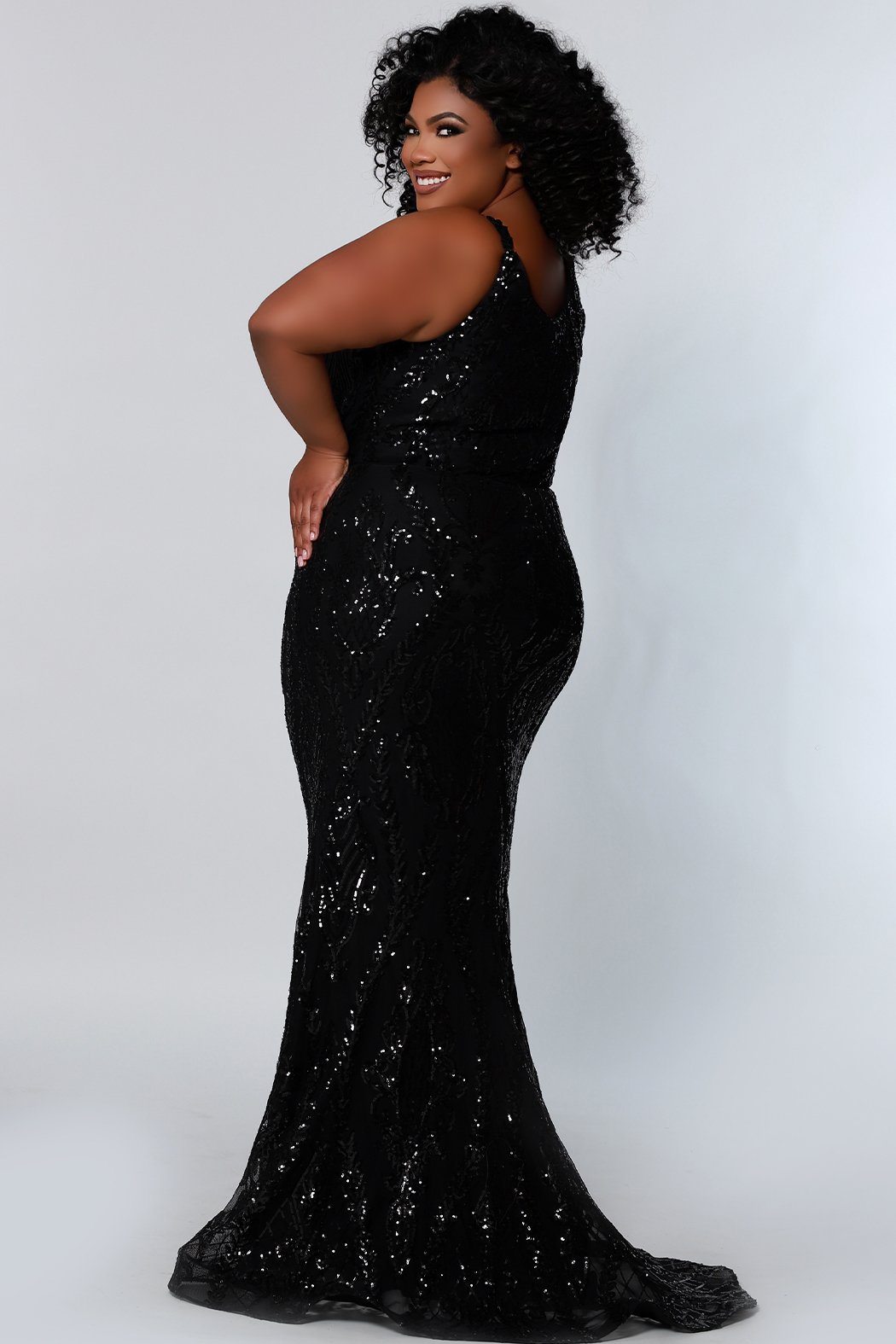 Sydney's Prom by Sydney's Closet slim aline silhouette with scoop neckline and scoop back center back zipper and sequins over stretch knit with 5 inch train available in black SC7332