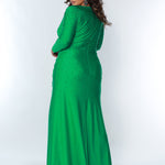 Sydney’s Closet SC7345 Stretch lycra with hot fix stones in Kelly green. Fitted silhouette, full length sleeves and a deep V-neckline. Natural waist with ruching and left leg slit. A high back and sweep train.