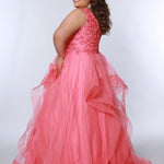 Sydney’s Closet SC7347 in coral. Tulle ballgown with lace appliques on bodice. Offered in light blue, coral, light pink and lilac purple. Has a V-neckline, bra-friendly straps and a natural waistline. A tried tulle skirt with horsehair hem. Invisible back zipper