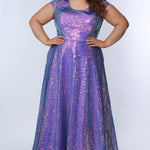 Sydney’s Closet SC7348 in purple. A-line silhouette with a scoop neckline and cap sleeves. Multidimensional sequins, offered in light blue, purple and peacock green. Has a natural waistline, A-line skirt with pockets, and a horsehair hem. 