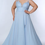 Sydney’s Closet SC7351 in light blue. Full A-line silhouette with a deep V-neckline and lace covered double straps. Chiffon, A-line skirt with a slit, and lace covered bodice with exposed boning. A natural waistline and partially lined bodice