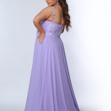 Sydney’s Closet SC7351 in light purple. Full A-line silhouette with a deep V-neckline and lace covered double straps. Chiffon, A-line skirt with a slit, and lace covered bodice with exposed boning. A natural waistline and partially lined bodice
