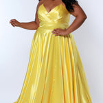 Sydney’s Closet SC7355 in lemon yellow. Full A-line silhouette with a Sweetheart neckline and spaghetti straps. Has a lace up back, modesty panel and fully lined skirt with pockets and a slit. Offered in apricot orange, lemon yellow, lime green and raspberry pink.