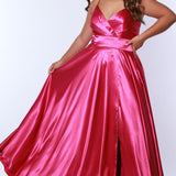 Sydney’s Closet SC7355 in raspberry pink. Full A-line silhouette with a Sweetheart neckline and spaghetti straps. Has a lace up back, modesty panel and fully lined skirt with pockets and a slit. Offered in apricot orange, lemon yellow, lime green and raspberry pink.